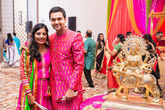Indian bride and groom during their garba celebration. indian bride and groom,indian wedding garba,garba decoration