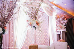 Stunning white floral arrangements for the reception stage. Stunning white floral arrangements for the reception stage.
