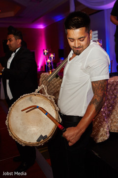 Dhol Player at Indian Wedding Reception Dhol Player at Indian Wedding Reception