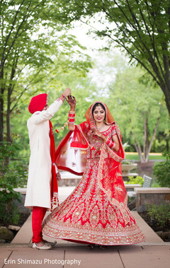 Lovely Indian couple in matching wedding outfits Lovely Indian couple in matching wedding outfits