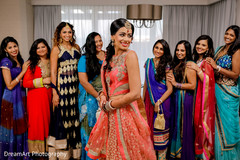 Lovely indian bride in a coral sangeet outfit. Lovely indian bride in a coral sangeet outfit.