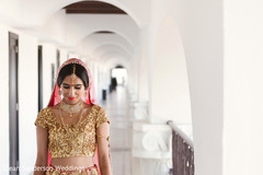 Indian bride glowing in her wedding attire. Indian bride glowing in her wedding attire.