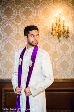 Stunning raja ready in his white sherwani. indian groom fashion,indian groom,indian groom sherwani