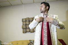 Elegant indian groom getting ready for the wedding. Elegant indian groom getting ready for the wedding.