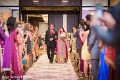 Indian Bride Walking Down The Aisle With Father indian bride walking down the aisle with father