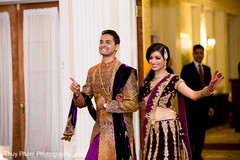 Indian couple making their wedding entrance Indian couple making their wedding entrance
