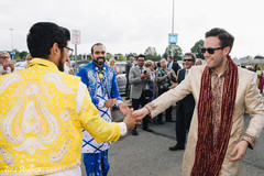 Family welcoming indian groom Family welcoming indian groom