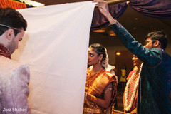 Bride and groom before meeting for the first time during wedding ceremony Bride and groom before meeting for the first time during wedding ceremony