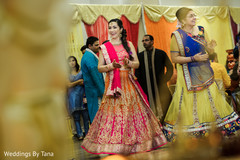 Beautiful bride dancing at the sangeet celebration. Beautiful bride dancing at the sangeet celebration.