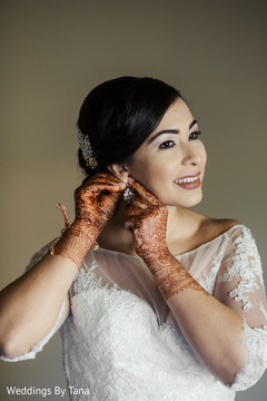 Dreamy indian bride getting ready. Dreamy indian bride getting ready.