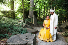 Beautiful maharani and raja posing in the forest. Beautiful maharani and raja posing in the forest.