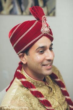 Raja wearing an elegant red turban. Raja wearing an elegant red turban.