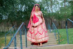Bride in traditional red and gold lengha. Bride in traditional red and gold lengha.