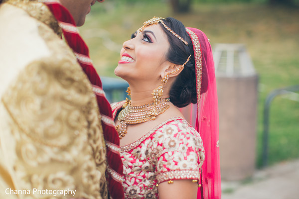 Indian bride admiring her groom.