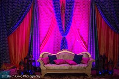 Hot pink and blue themed sangeet stage. Hot pink and blue themed sangeet stage.