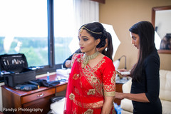 Indian bride final touch ups. Indian bride final touch ups.