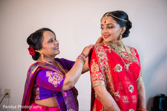 Mother helping the bride to get ready. Mother helping the bride to get ready.
