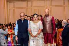 Indian bride arriving at wedding ceremony Indian bride arriving at wedding ceremony