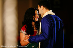 Sweet moment of bride and groom at the sangeet. Sweet moment of bride and groom at the sangeet.