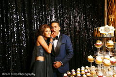 Lovely couple eating their wedding cupcakes. Lovely couple eating their wedding cupcakes.