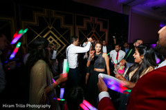 Indian couple showing off their moves at the dance floor. Indian couple showing off their moves at the dance floor.