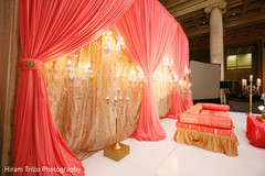 Coral and golden mandap stage. Coral and golden mandap stage.