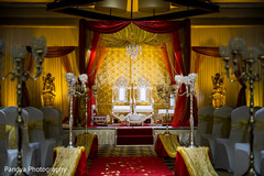 Red and yellow themed mandap stage. Red and yellow themed mandap stage.
