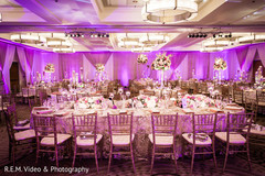 Magnificent golden and purple wedding reception decor. Magnificent golden and purple wedding reception decor.