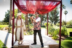 Indian groom with wedding musician before the ceremony Indian groom with wedding musician before the ceremony