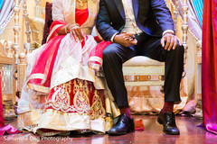 Enchanting shot of indian bride and groom at their sangeet night. Enchanting shot of indian bride and groom at their sangeet night.