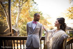 Indian groom seeing the bride for the first time before wedding ceremony Indian groom seeing the bride for the first time before wedding ceremony
