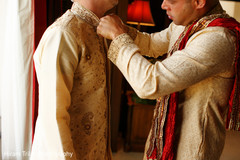 Indian groom getting ready for wedding ceremony indian wedding gallery,indian groom sherwani,indian groom getting ready