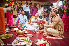 Indian groom during wedding ceremony Indian groom during wedding ceremony