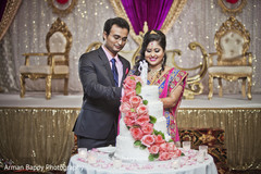Sweet couple cutting the cake Sweet couple cutting the cake