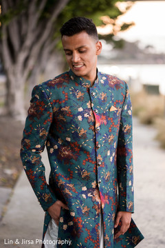 Indian groom wearing a beautiful sherwani design. Indian groom wearing a beautiful sherwani design.