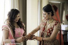 Charming maharani puts her bangles on. Charming maharani puts her bangles on.