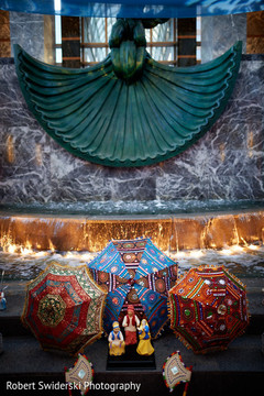 Umbrellas decorating the sangeet stage. Umbrellas decorating the sangeet stage.