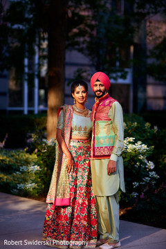 Sikh couple in sangeet outfits. Sikh couple in sangeet outfits.