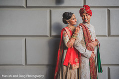 Indian couple posing in their wedding attire. Indian couple posing in their wedding attire.