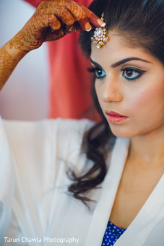Indian bride gets ready for her wedding day. Indian bride gets ready for her wedding day.
