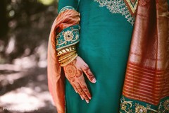 Indian bride photoshoot before sangeet ceremony outdoor photography,indian wedding henna,indian pre-wedding celebrations