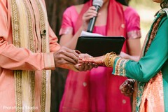 Indian couple exchanging wedding rings at sangeet ceremony indian wedding rings,indian bridal mehndi,indian sangeet