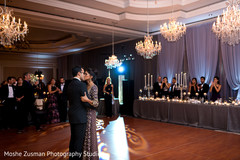 Indian couple first dance and kiss at wedding reception Indian couple first dance and kiss at wedding reception