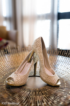 Cream bridal heels. indian bride getting ready,indian bridal fashions,indian wedding shoes