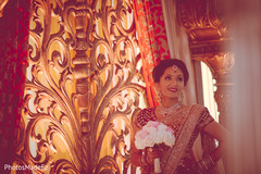 Indian bride photoshoot before wedding ceremony indian bridal fashions,bridal tikka,indian bridal bouquet