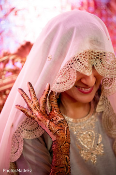 Indian bride at mehndi party indian wedding mehndi party,indian wedding henna,indian pre-wedding celebrations
