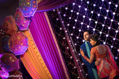 Indian couple photoshoot at sangeet ceremony lightning,indian wedding planning and design,indian bride