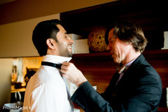 Indian groom getting ready for wedding reception Indian groom getting ready for wedding reception