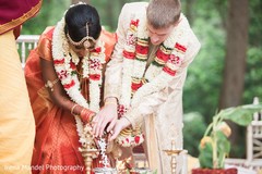Lovely couple during their wedding indian wedding ceremony,indian fusion wedding
