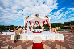 White draped outdoor mandap. White draped outdoor mandap.